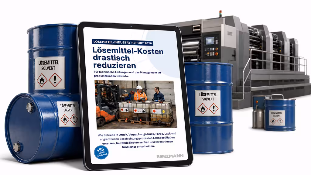 Solvent drums and tablets in front of an industrial facility